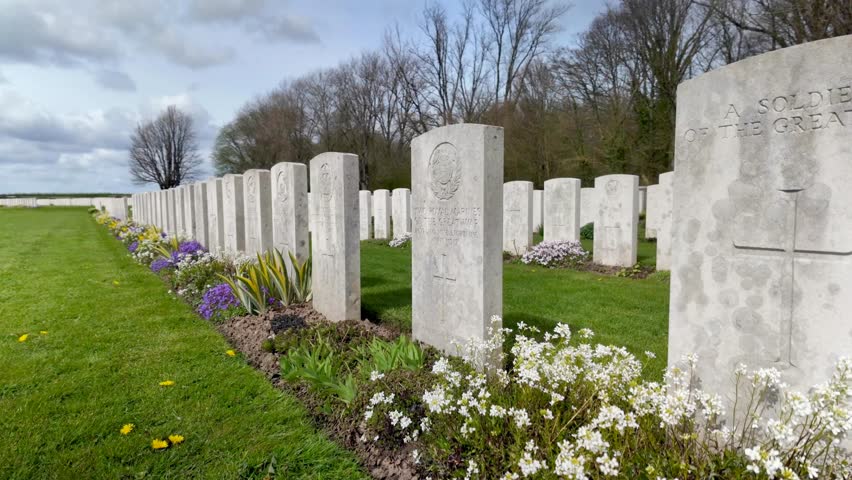 Vimy Canadian cemetery panning showing aligned headstone in a WW1 memorial landscape in Artois, Hauts de France. 60fps.