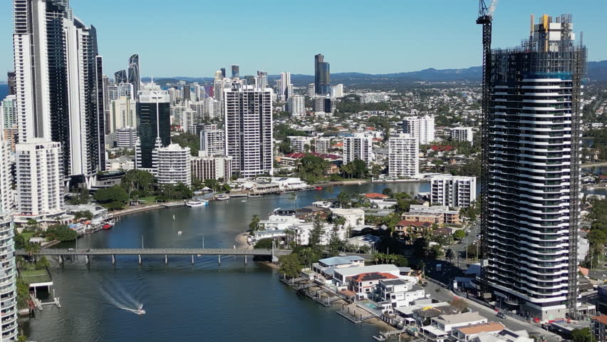 Aerial view of the cityscape of Gold Coast Australia. High-rises between the canals, a city on the Pacific coast, travel and tourism in Queensland.