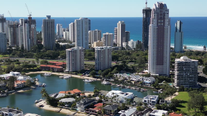 Aerial view of cityscape Gold Coast Queensland Australia. High-rise buildings on the Pacific Ocean shore modern architecture travel and tourism.