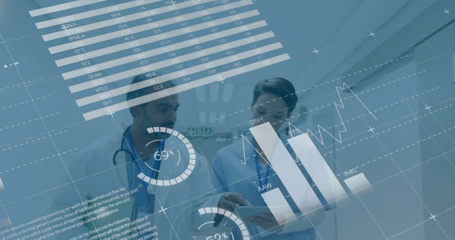 Physician and nurse reviewing data walking hospital hall tablet syncing causing charts across faces. Clinicians, healthcare, corridor, stethoscope, device, overlays, graphs