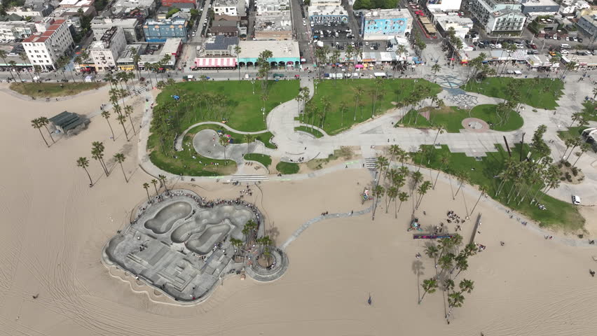 Venice Beach, California, USA - High Aerial View of Recreation Center With Skate Park and Boardwalk on a Cloudy Day