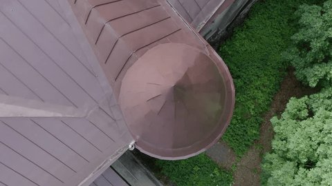 Vertical Drone Spin over Residential Building Roof