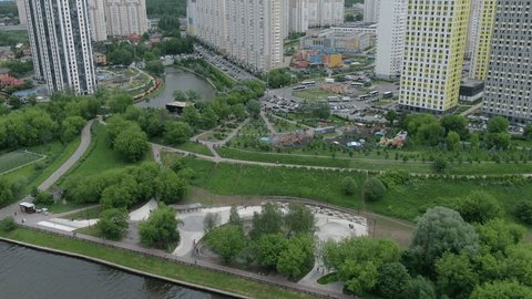 Drone Circling above Riverside Park Playground