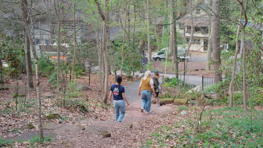 People Walking Down Historic Stone Stairs in Wooded Mount Gretna Pennsylvania