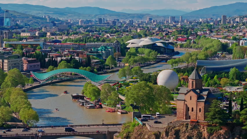 Aerial perspective of downtown Tbilisi, revealing the vibrant heart of Georgia’s capital with detailed city patterns, architecture, and lively urban structure.