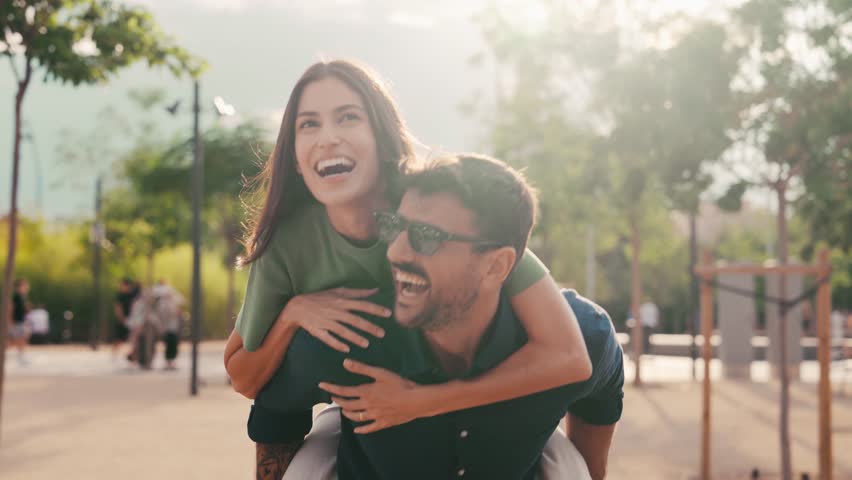 Video of cute couple having fun together in a park
