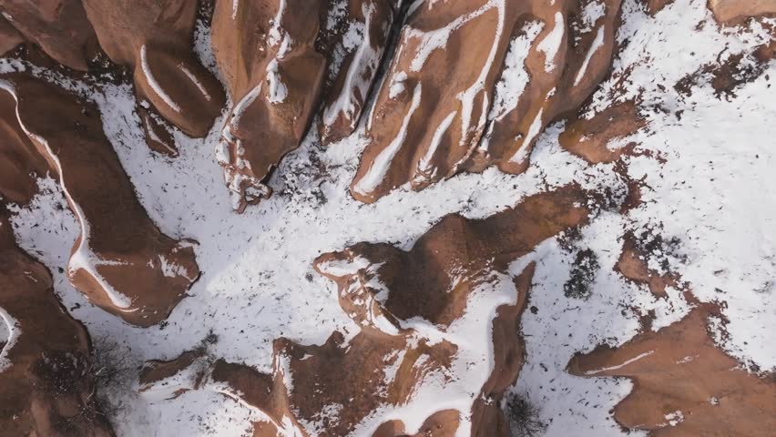 Snow-covered Rose Valley Near Göreme In The Cappadocia Region Of Turkey. Aerial Topdown drone Shot