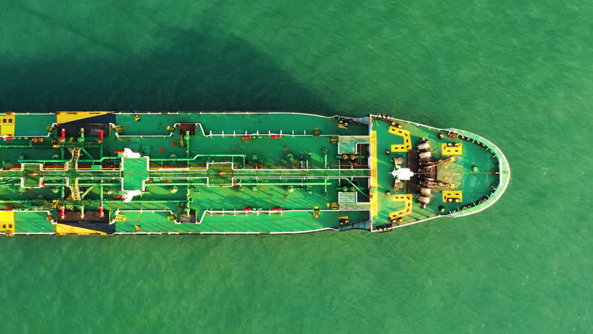 Aerial top view of an oil tanker at sea transporting crude oil across global shipping routes, supporting energy supply chain, maritime logistics, and international import export trade.