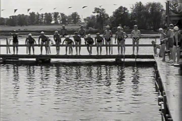 1930s - Summertime activities including kids swimming, 1937.
