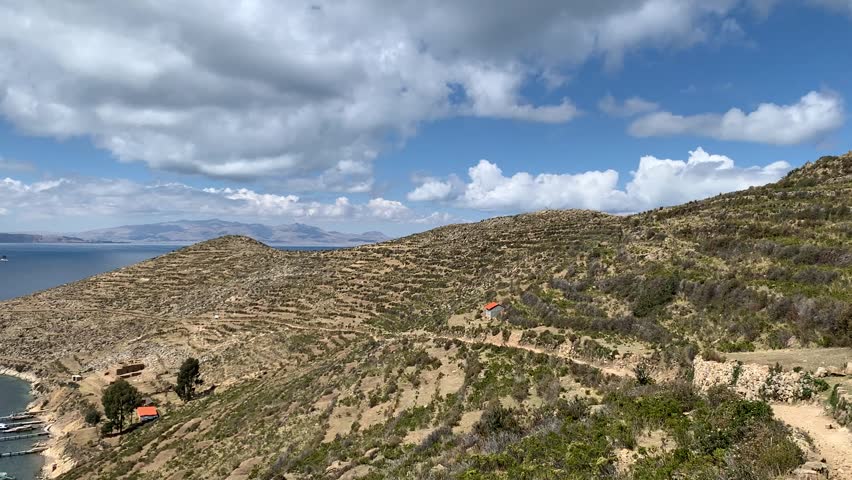 The horizon of Lake Titicaca as seen from an island in the middle of the lake, located near the city of Copacabana, Bolivia.