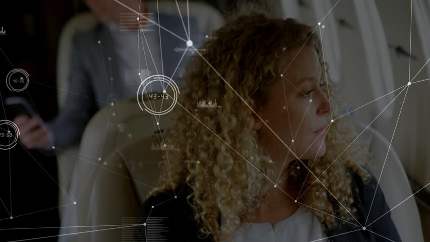 Woman front-right gazing while man tapping phone, making network UI grow over both for business. Cabin, jet, leather, window, overlay, analytics, corporate