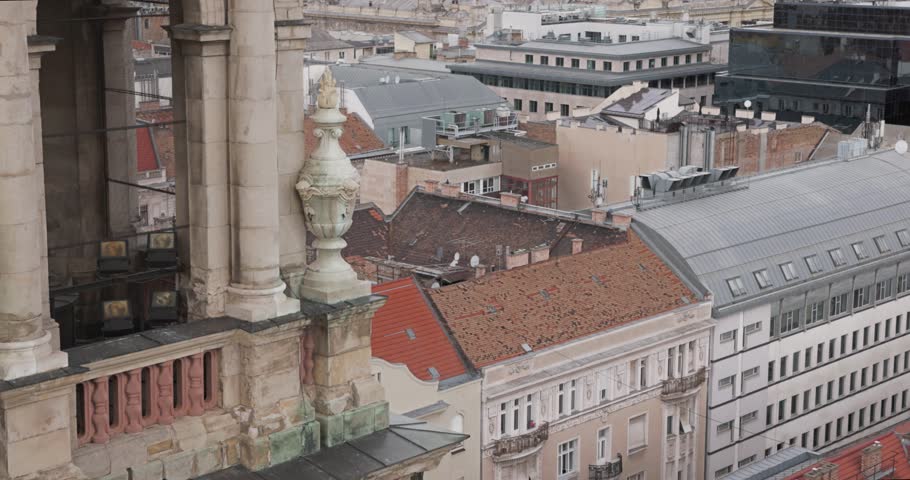 Panoramic cityscape of Budapest, Hungary with the Hungarian Parliament building and historic rooftops. - Tilt Up
