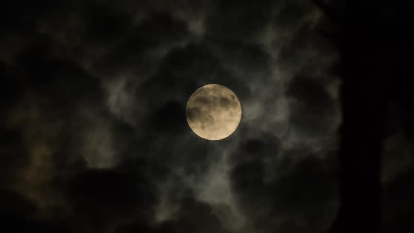 Mystical Full Moon Behind Clouds Dark Nature Background. Dark Sky Full Moon Atmospheric Night Background