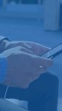 Animation of clouds with electronic devices over caucasian businessman using smartphone. global cloud computing, digital interface and data processing concept digitally generated video. - Powered by Shutterstock - Get 15% off with code: PIKWIZARD15