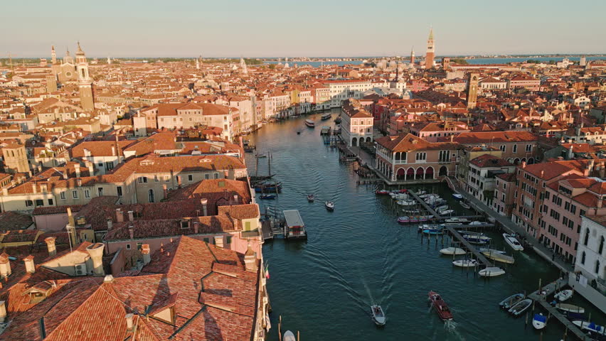 Venezia aerial view. Venice Grand Canal and San Marco Square from drone. Venezia Italy cityscape. Venice famous city. Venice skyline panorama. Venice along canals with gondola.