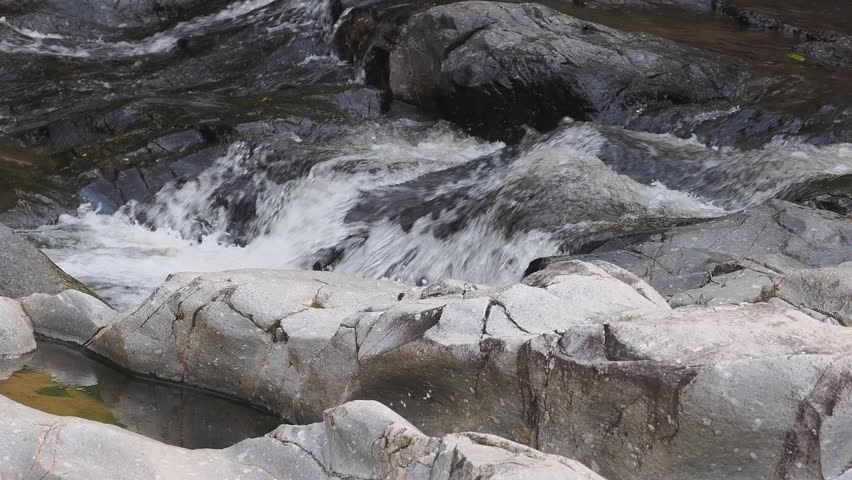 Waterfall in the forest national park with rocks 