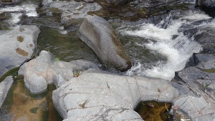 Waterfall in the forest national park with rocks 