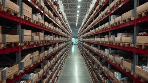Drone Flying Forward through Warehouse Storage Aisle