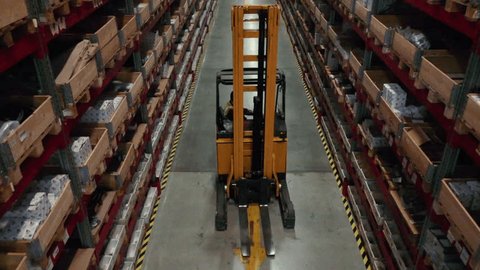 Drone Following Forklift through Warehouse Storage Aisle