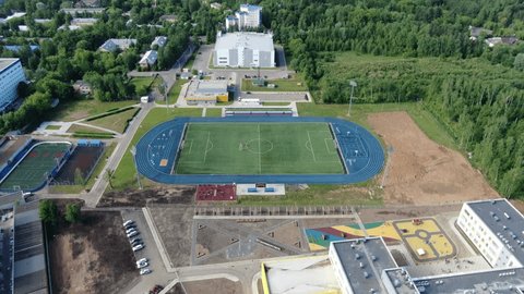Aerial Descent over Sports Field Track
