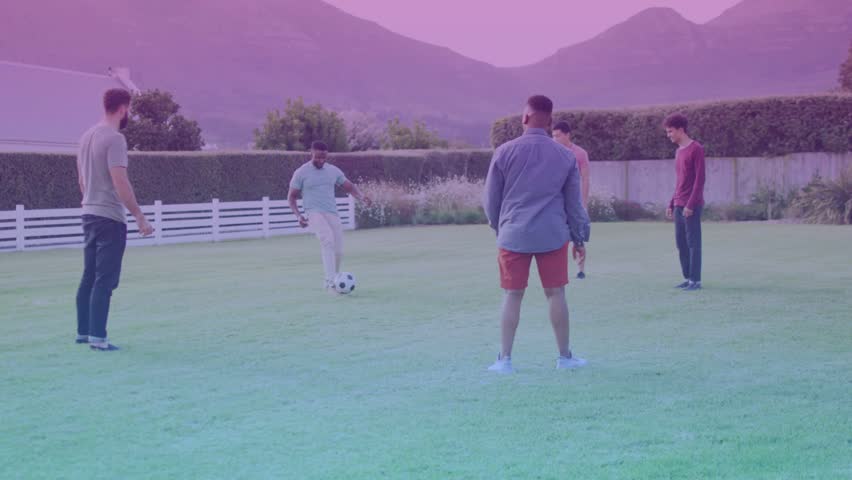 Lead man kicking soccer ball starting five men passing for sports, yard bokeh masking players. Group, garden, lawn, circle, dusk, sunset, hedge
