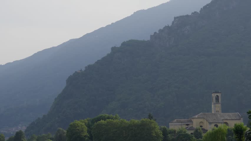 Church situated at the base of a large mountain near Lake Como in Italy