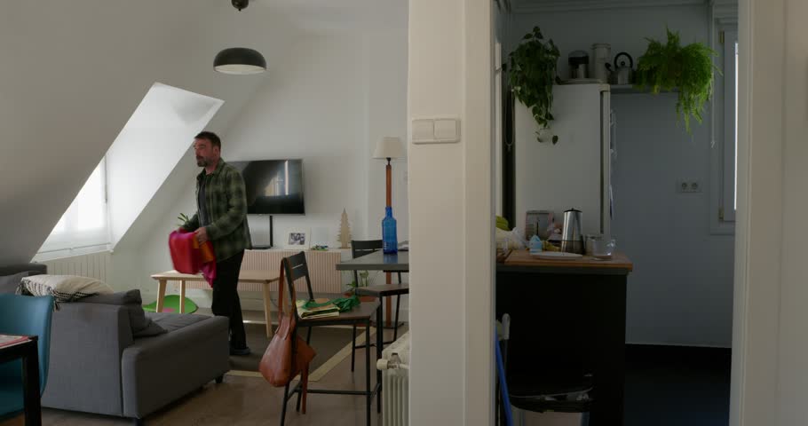Interior Living: A glimpse inside a contemporary living space, with a person interacting with their surroundings, blending modern design and elements.