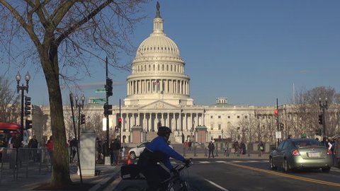 WASHINGTON DC - USA, MARCH 25, 2013, Streetlife and The United States Capitol building by day