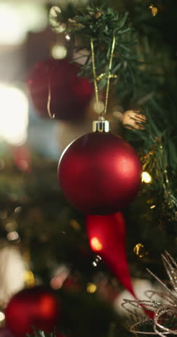 Ball, trinket and tree with bauble for Christmas decoration, celebration and holiday tradition. Bokeh, lights and ornament with sparkle for festive season, xmas event and aesthetic for party at house