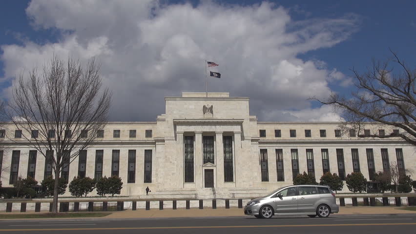 WASHINGTON DC - USA, MARCH 25, 2013, United States Federal Reserve building and traffic street by day