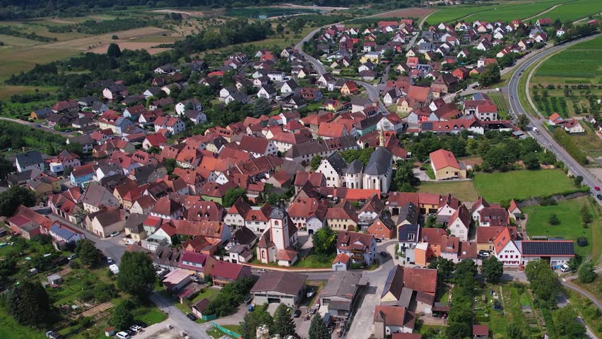 Aerial view around the old town of the city Astheim beside Volkach on a sunny spring noon in Germany, Bavaria