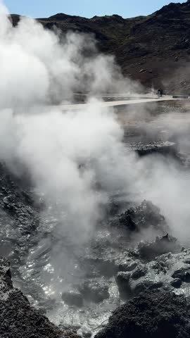 Boiling and bubbling mud pot at Krysuvik geothermal area on Reykjanes peninsula, Iceland