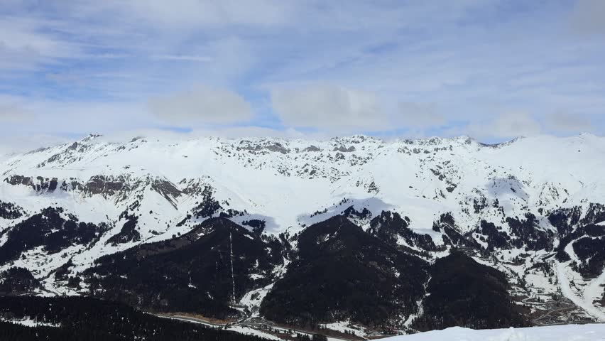Snow-capped mountain peaks. A magnificent natural landscape.