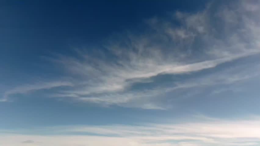 Soft Clouds Drift Across a Clear Sky Above Pitt Meadows Farm in Pitt Meadows, British Columbia, Canada - Static Shot