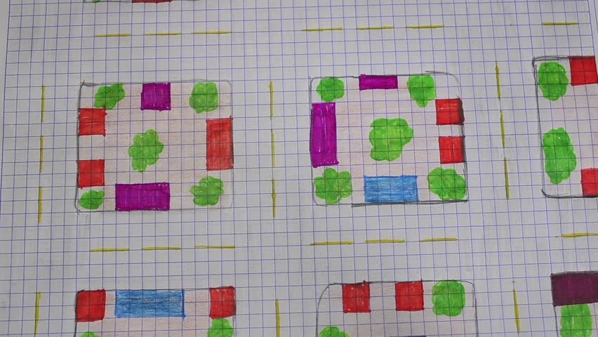  A closeup of various groups of toy cars passing by the lanes of a peper city