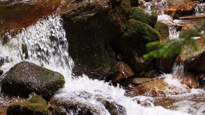 Mountain waterfall in early spring.