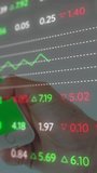 The global business finance concept is a digitally generated image that represents the stock exchange display board with graphs and numbers changing. Sport competition global communication and digital - Powered by Shutterstock - Get 15% off with code: PIKWIZARD15