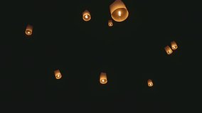Sky lanterns, flying lanterns, floating lanterns, hot-air balloons Loy Krathong Festival in Chiang Mai Thailand. - Powered by Shutterstock - Get 15% off with code: PIKWIZARD15