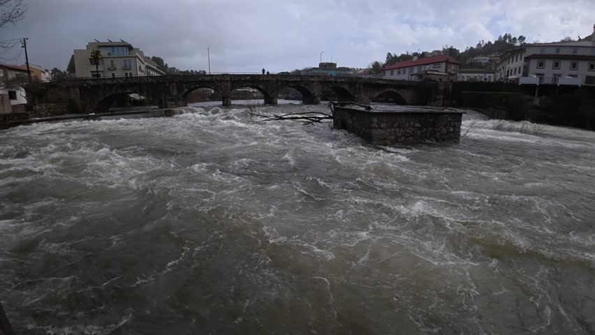 Strong river current after heavy rainfall. Floods season. Monsoon.