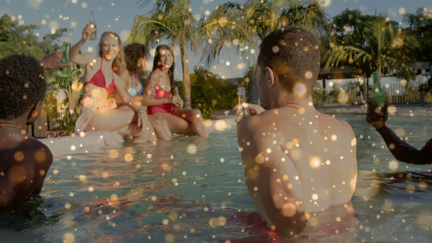 Women by pool lifting bottle toasting, men mirroring, sparkling overlay across frame for marketing. Ladies, friends, celebration, toast, tropical, resort, cabana