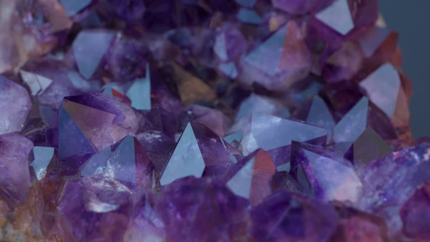 A macro of a purple amethyst druse