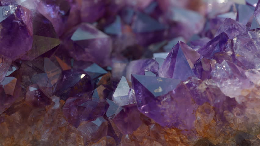 A macro of a purple amethyst druse