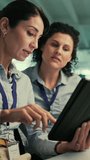 Tablet, meeting and business women in office with research for AI development project. Digital technology, discussion and team of female engineers with planning for computing assignment in workplace. - Powered by Shutterstock - Get 15% off with code: PIKWIZARD15