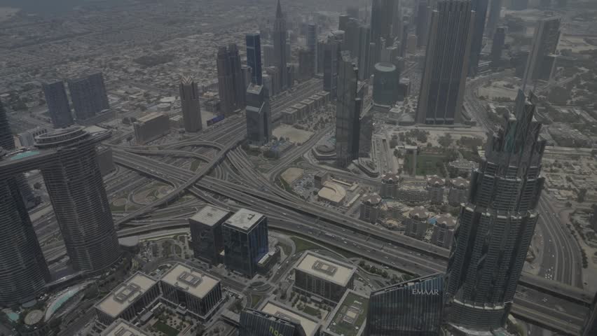 Citys scape view from Burj Khalifa, biggest building in the world. Dubai