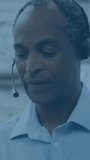 Customer service representative with headset, data processing animation over warehouse background. Customer support, call center, help desk, communication, logistics, technology - Powered by Shutterstock - Get 15% off with code: PIKWIZARD15