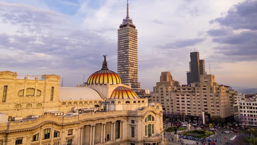 Aerial timelapse of Palacio de Bellas Artes and Torre Latinoamericana at sunset in Mexico City