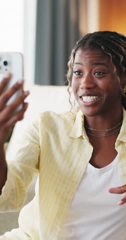 Talking, phone and black woman with video call in lounge, funny conversation and share gossip on weekend. Contact, speaking and happy person with mobile for virtual chat, connection and laugh in home