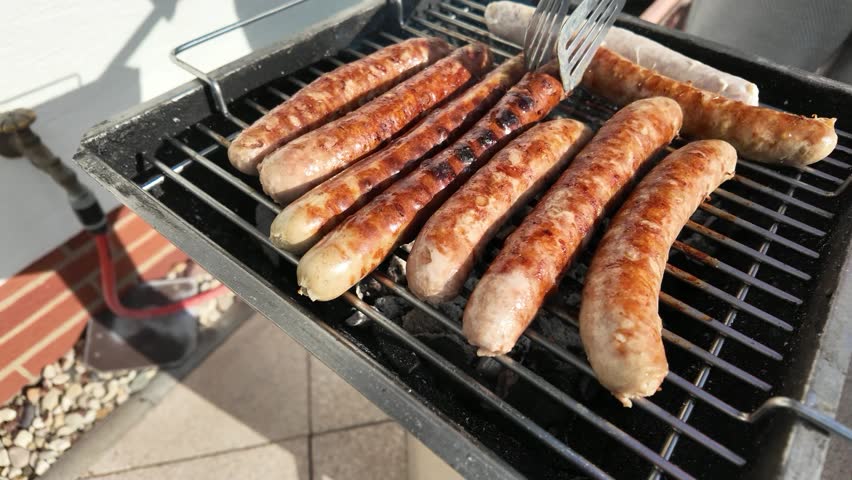 Thuringian bratwurst on a charcoal grill