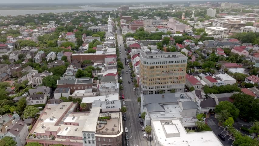 Downtown Charleston, South Carolina with drone video moving in wide.