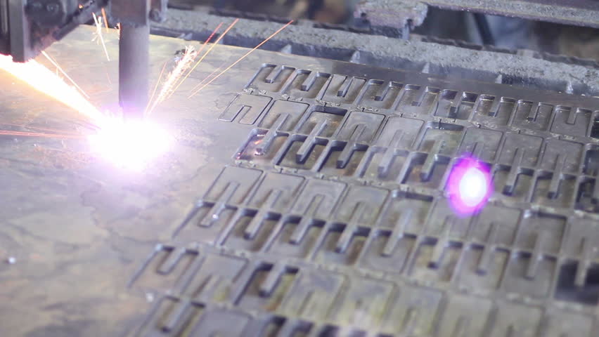 Plasma laser cutting process, metal plate being cut